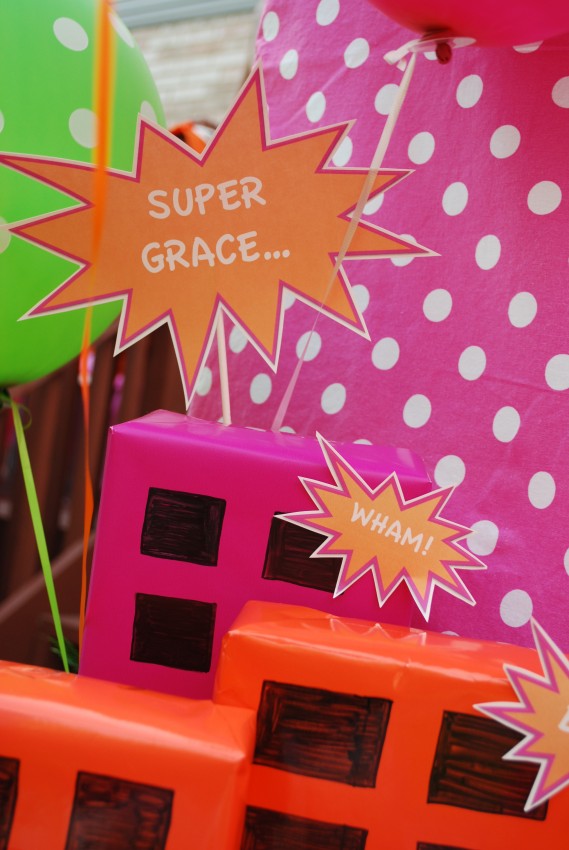 Girl's superhero birthday party -buildings on dessert table