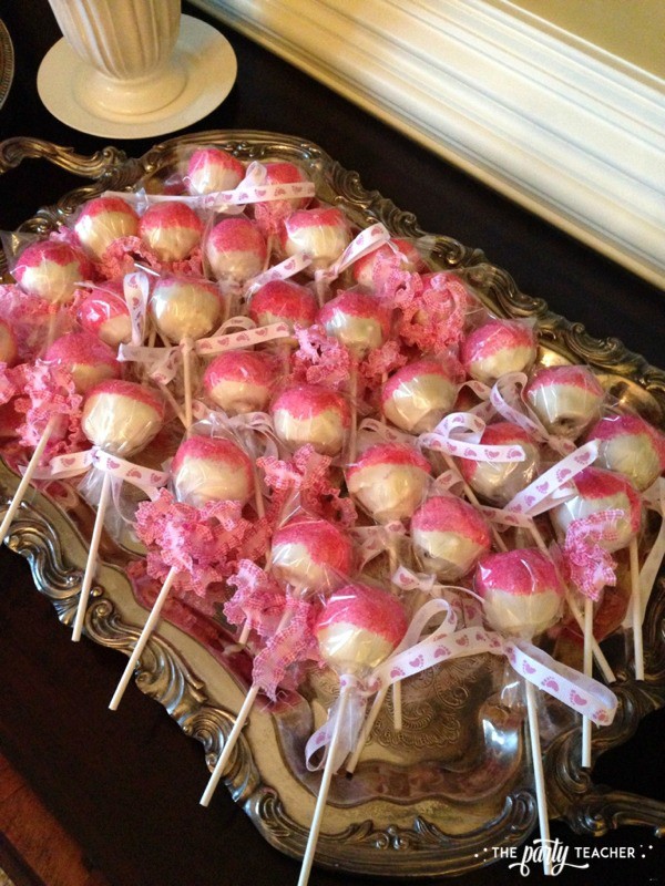 Baby carriage inspired baby shower by The Party Teacher - cake pops