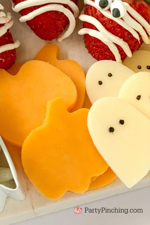Party Pinching Halloween Charcuterie Board - cheese ghosts